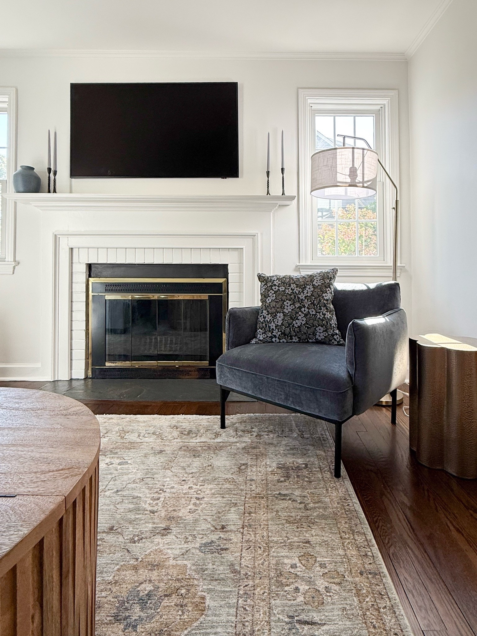 This living room has such a timeless feel. The mix of the classic fireplace, deep blue accent chair, layered rug, and warm wood tones creates a space that feels both sophisticated and comfortable for everyday living.

living room decor, neutral living room, blue accent chair, fireplace decor, area rug, coffee table styling, classic home design, modern coastal home, cozy living room ideas, timeless interiors, home styling inspiration, girlonthehudson

#LTKSeasonal #LTKHome #LTKdayinmylife