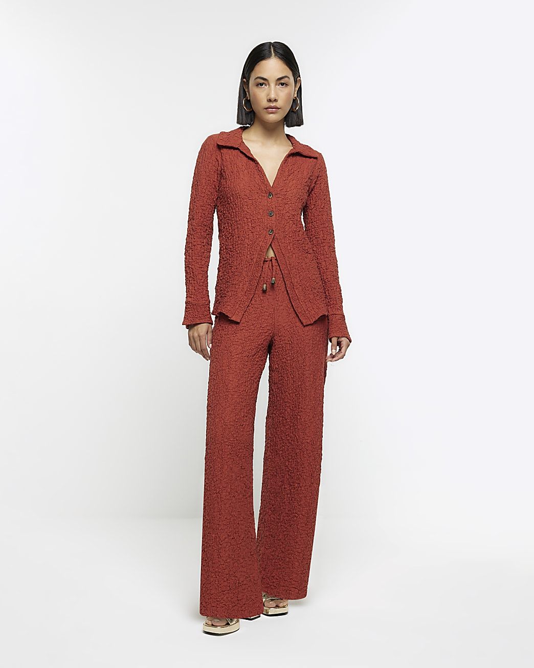 Rust textured wide leg trousers | River Island (UK & IE)
