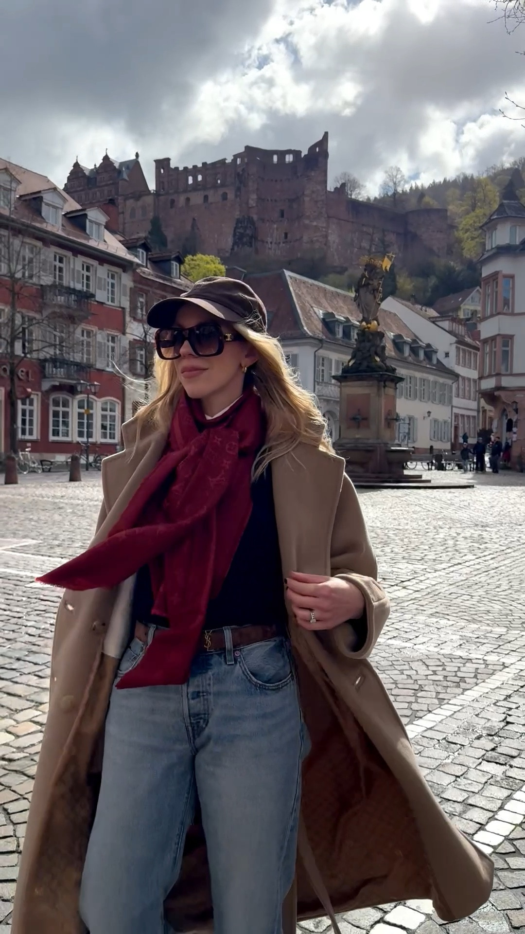 Travel look, European vacation, @Zara chocolate brown baseball cap, camel coat, red Louis Vuitton scarf, brown suede YSL belt, @Levi's 90’s baggy jeanss

#LTKOver40 #LTKTravel #LTKSaleAlert