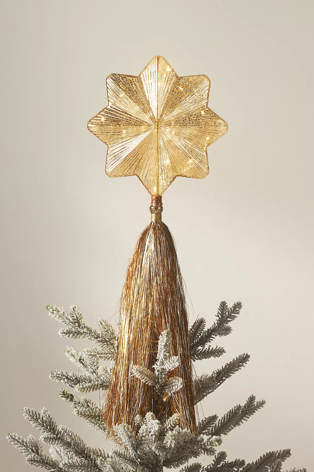 Light-Up Shooting Glass Star Tinsel Tree Topper | Anthropologie (US)