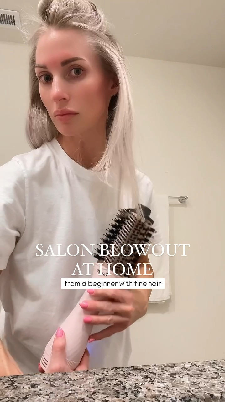 Easy salon blowout at home from a beginner. On SALE for $49.95! Normally $119. Ends today. 2-in-1 titanium dryer brush. Linking The straightener I have &amp; heat protectant I use too.
My style lasts all week using this. Great for refreshing your hair too.

How to use
•Wash hair
•Gently squeeze out excess water with your towel
•Apply heat protectant through mid lengths &amp; ends
(I use IGK Good Behavior)
•Dry with your normal dryer until about 70% dry
•Divide your hair into manageable sections (I do 4)
•Then begin styling with the dryer brush. Grab small sections
•Use the tool horizontally underneath each section of hair
•Work the brush dryer from root to tip until the section is dry (make sure to keep the dryer moving at all times)
•Repeat until desired style is achieved
•Turn on the cool setting to lock in the style
Hair tutorial. Hair routine. Blow dry hair. Blowout hair. Bombshell blowout. Hair tools. Hair styles. Easy hair tutorial. Hair styling tips. Beauty tools. Dryer brushes. 

#LTKBeauty #LTKVideo #LTKFindsUnder50