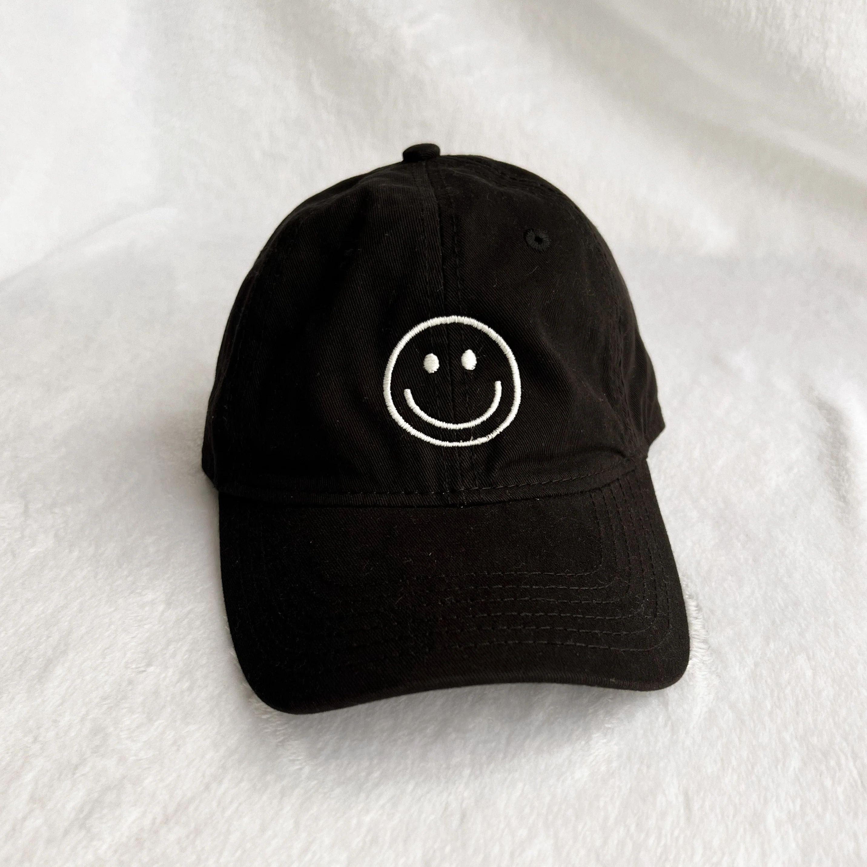 smiley face hat | black | Reef rain aria