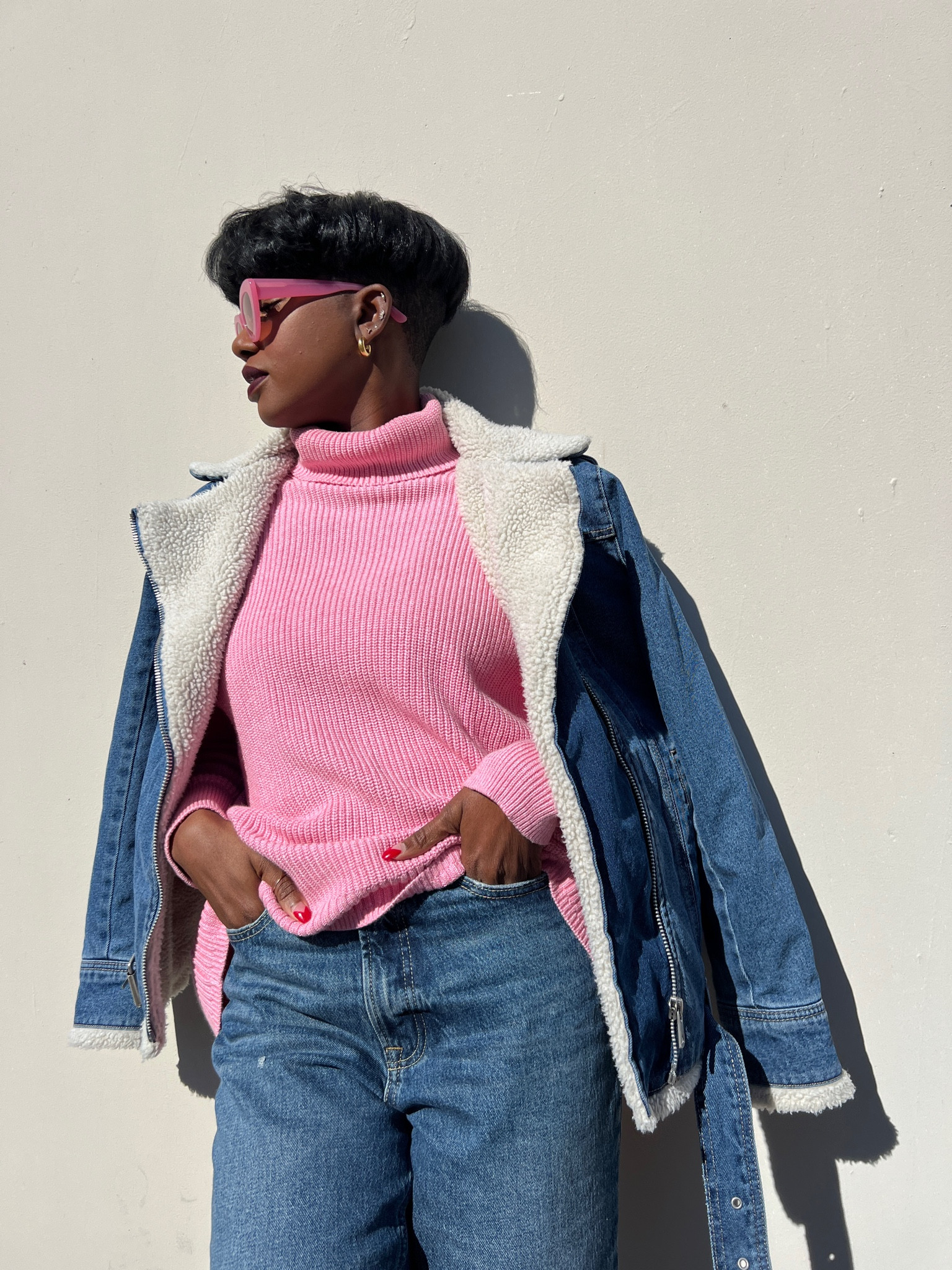 Pink turtle neck sweater, Sherpa shearling moto jacket, high rise denim and two bar sherpa slides  

#LTKstyletip #LTKFind #LTKunder100