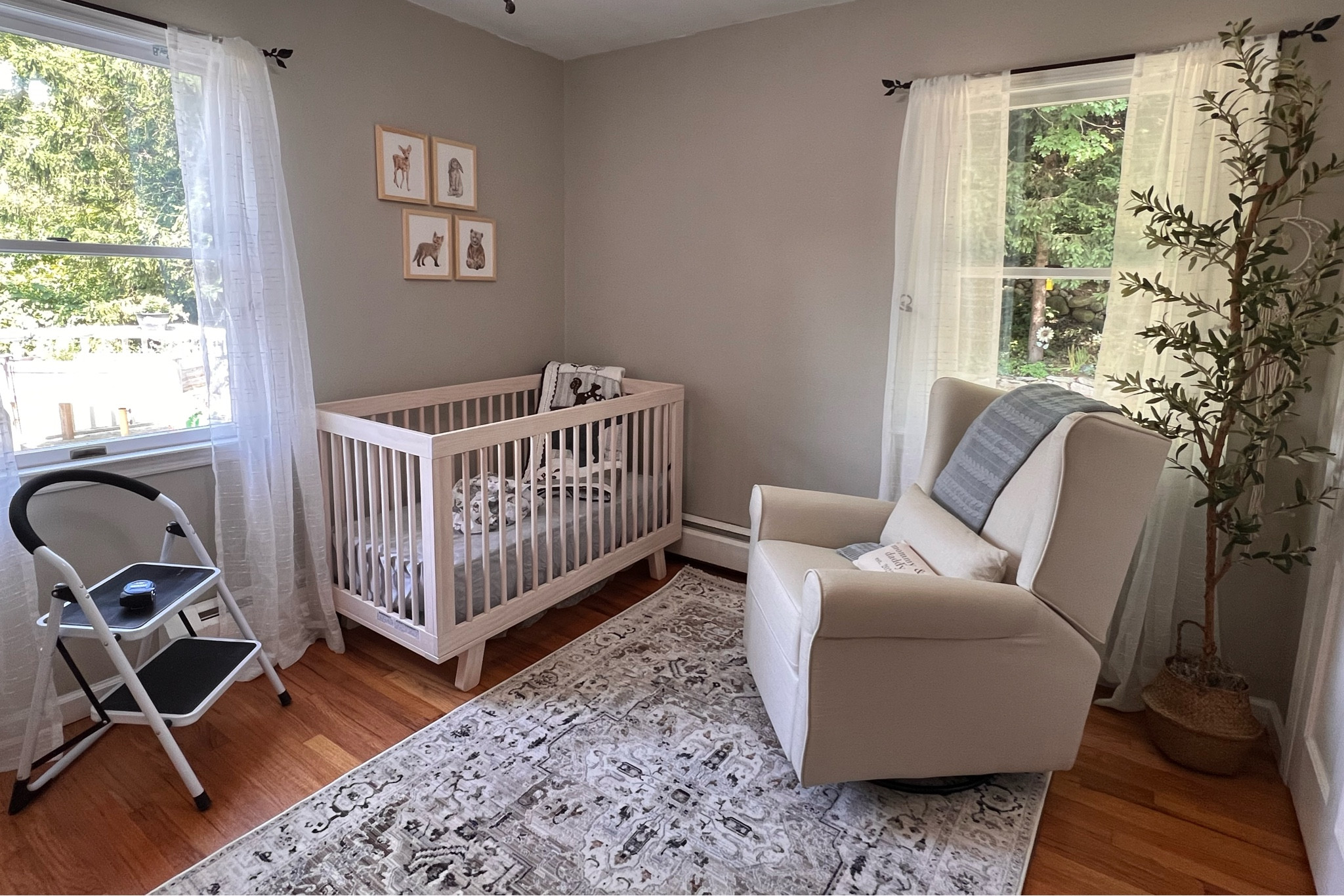 Nursery update ! Crib, photos, recliner chair, rug all linked. Nursery furniture . Nursery rug. Nursery chair. Nursery crib. Natural wood. Washed wood. Washed natural. 

#LTKbaby #LTKhome #LTKfamily