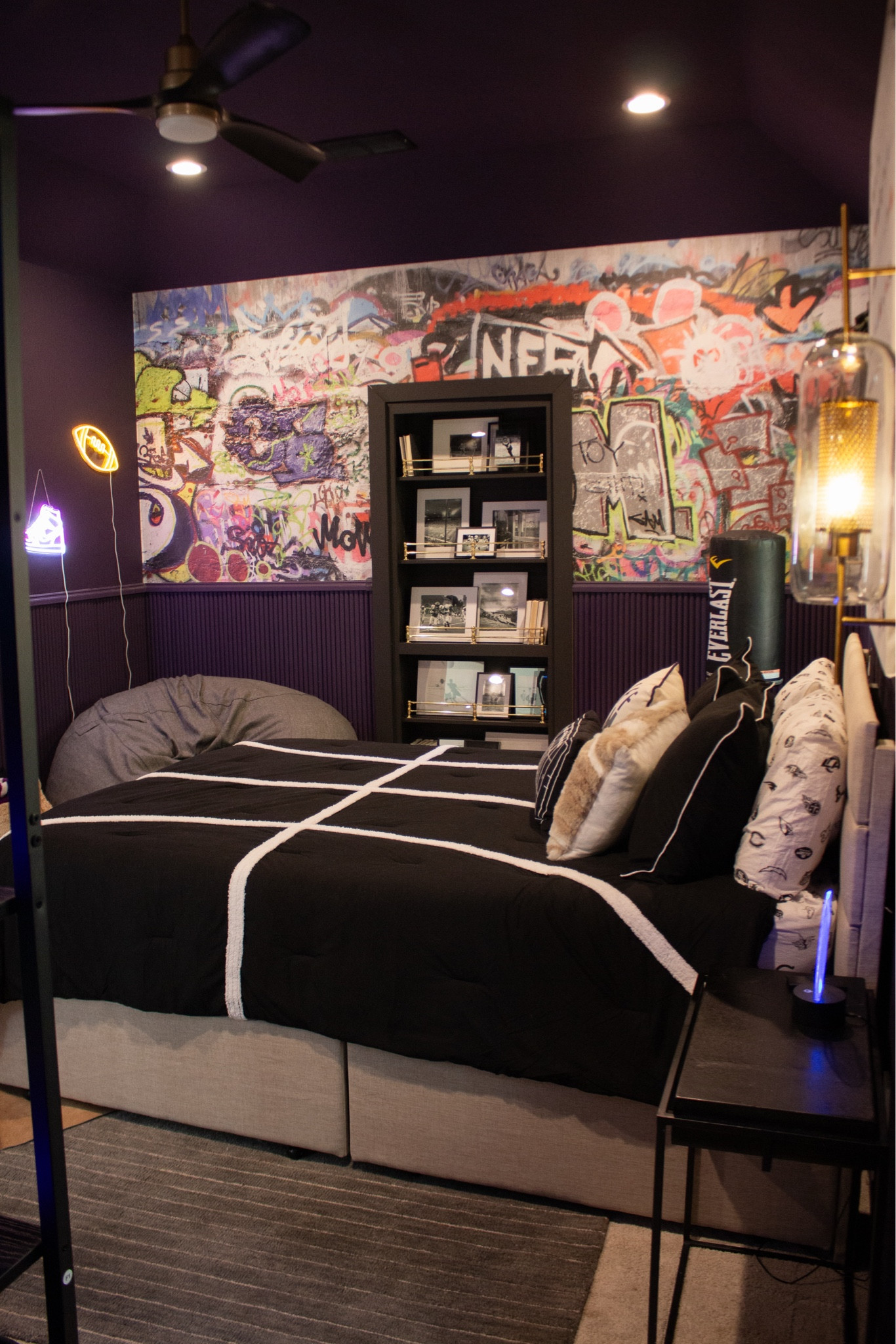 Modern teen bedroom decor with a sporty, edgy vibe
Black and neutral bedding, leather bench, graphic wall art, and moody paint for a designer look
Shop the exact items I used

#LTKSeasonal #LTKHome #LTKKids