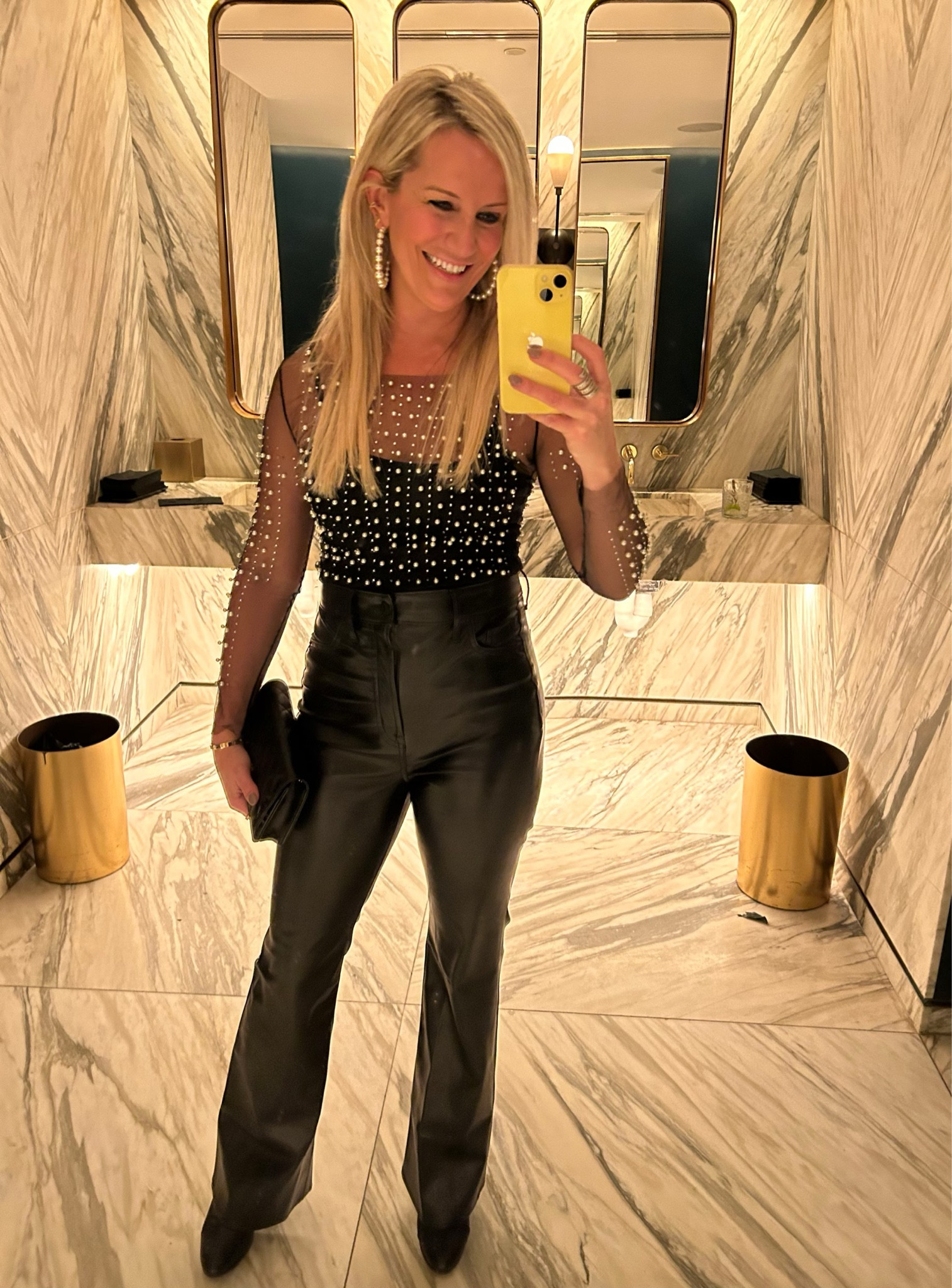 I’m so in love with this sheer, pearl and rhinestone top, I got it in black and white! Wear a bodysuit, or spaghetti strap tank underneath and it’s under 30!! Also love these old navy vegan leather flare pants! I’m in a size 2! 