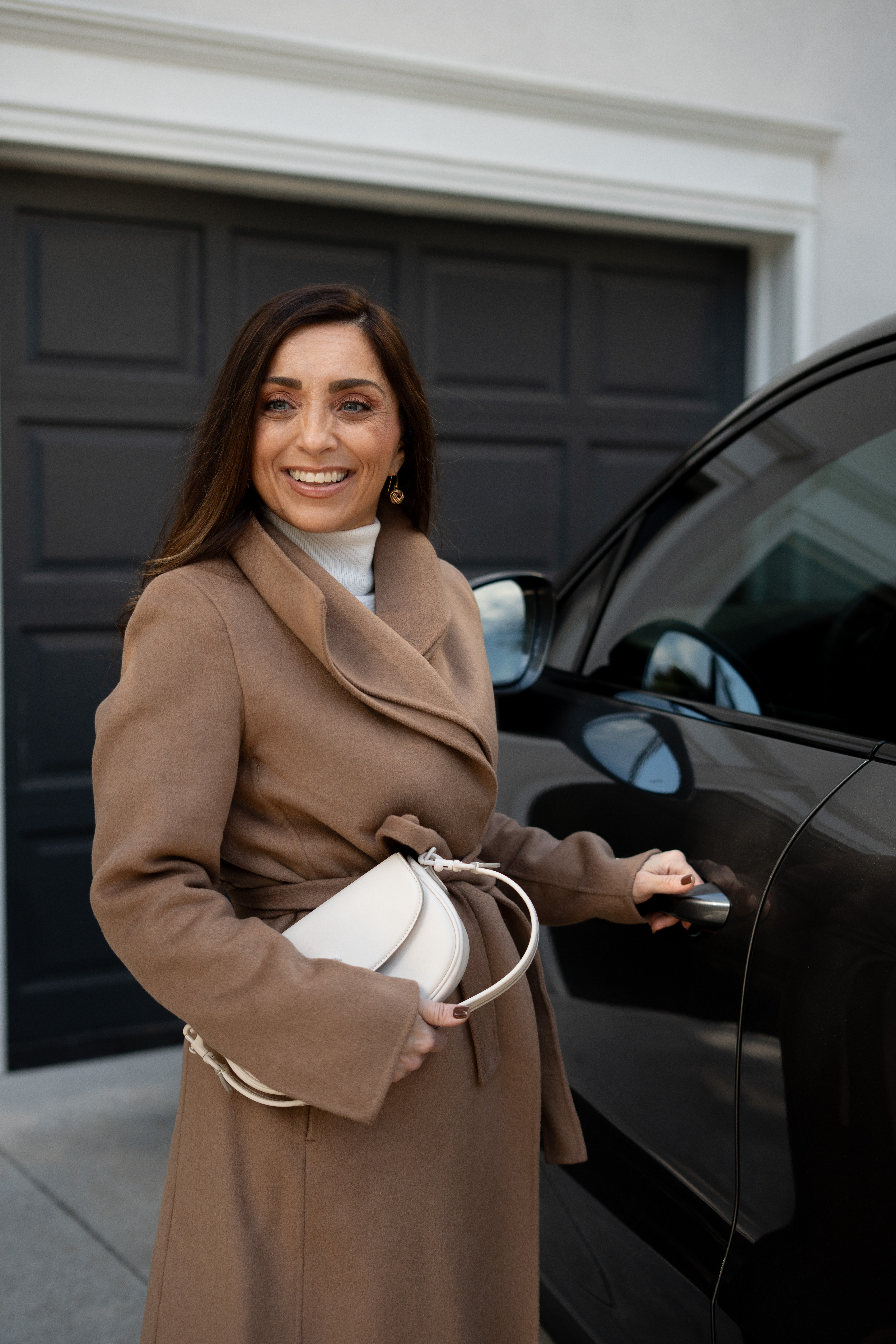 OMG this outfit moment has me swooning — the camel coat draped over white layers just feels so effortlessly elegant. The soft light, clean lines, and modern backdrop make it all come together in such a chic, minimal way. It’s that quiet confidence look — timeless, refined, and a little bit bold. Eeepp I’m obsessed with how luxe and pulled-together this feels without even trying! 

 #LTKSeasonal #LTKStyleTip #LTKBeauty