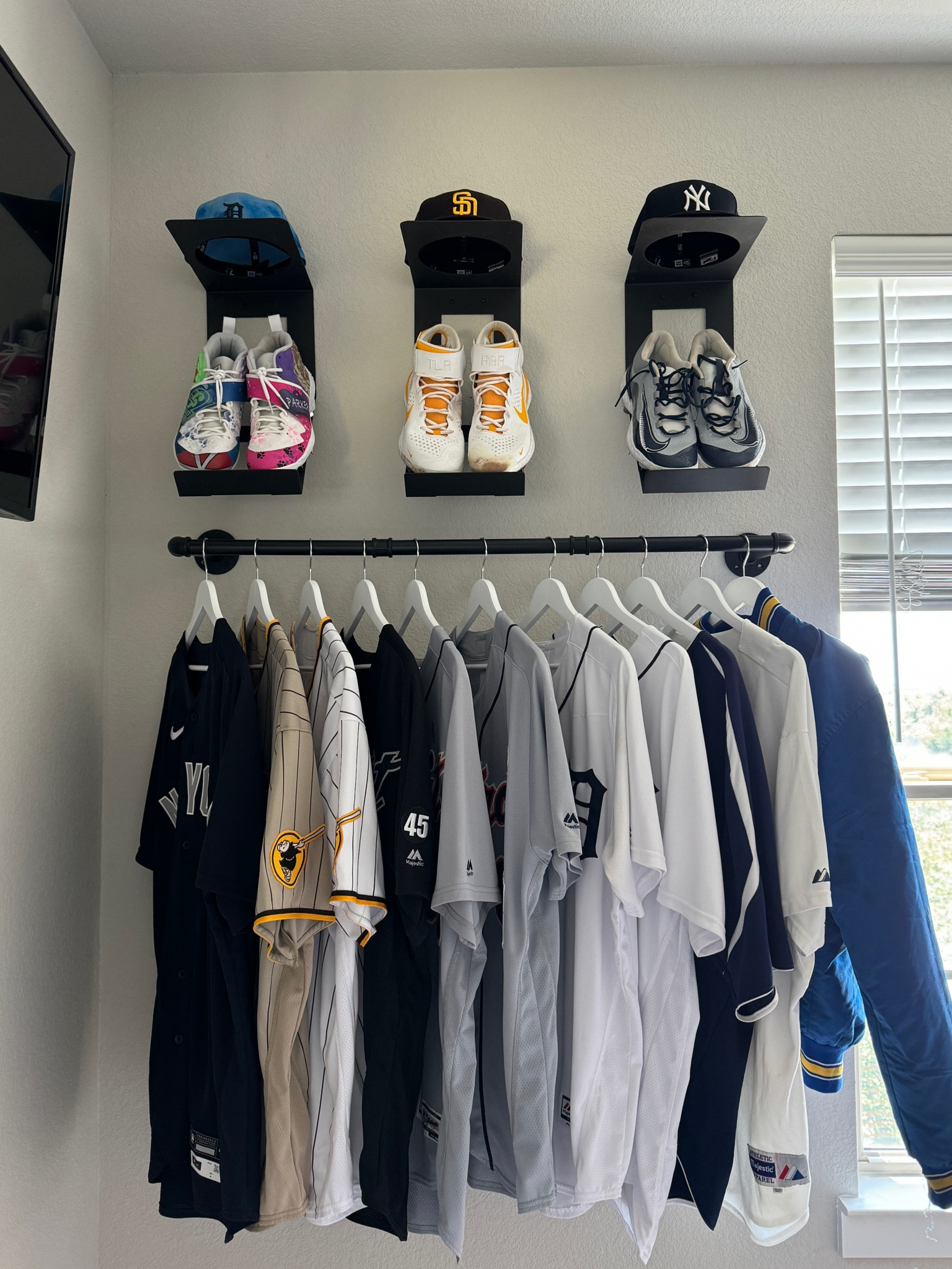 Pictured is the 40” wall clothing rack 

Baseball jersey display rack, hat display, shoe display, game room decor, memorabilia display 

#LTKSummerSales #LTKSaleAlert #LTKFindsUnder50