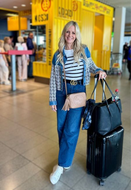Perfect travel look: comfy jeans, a lightweight sweater, and a stylish jean jacket. Layering is key for any adventure! #TravelOutfit #Layering #StyleOnTheGo #jeans #Gucci #Sandro #luggage 🌍🇳🇱🇪🇸

#LTKStyleTip #LTKOver40 #LTKTravel