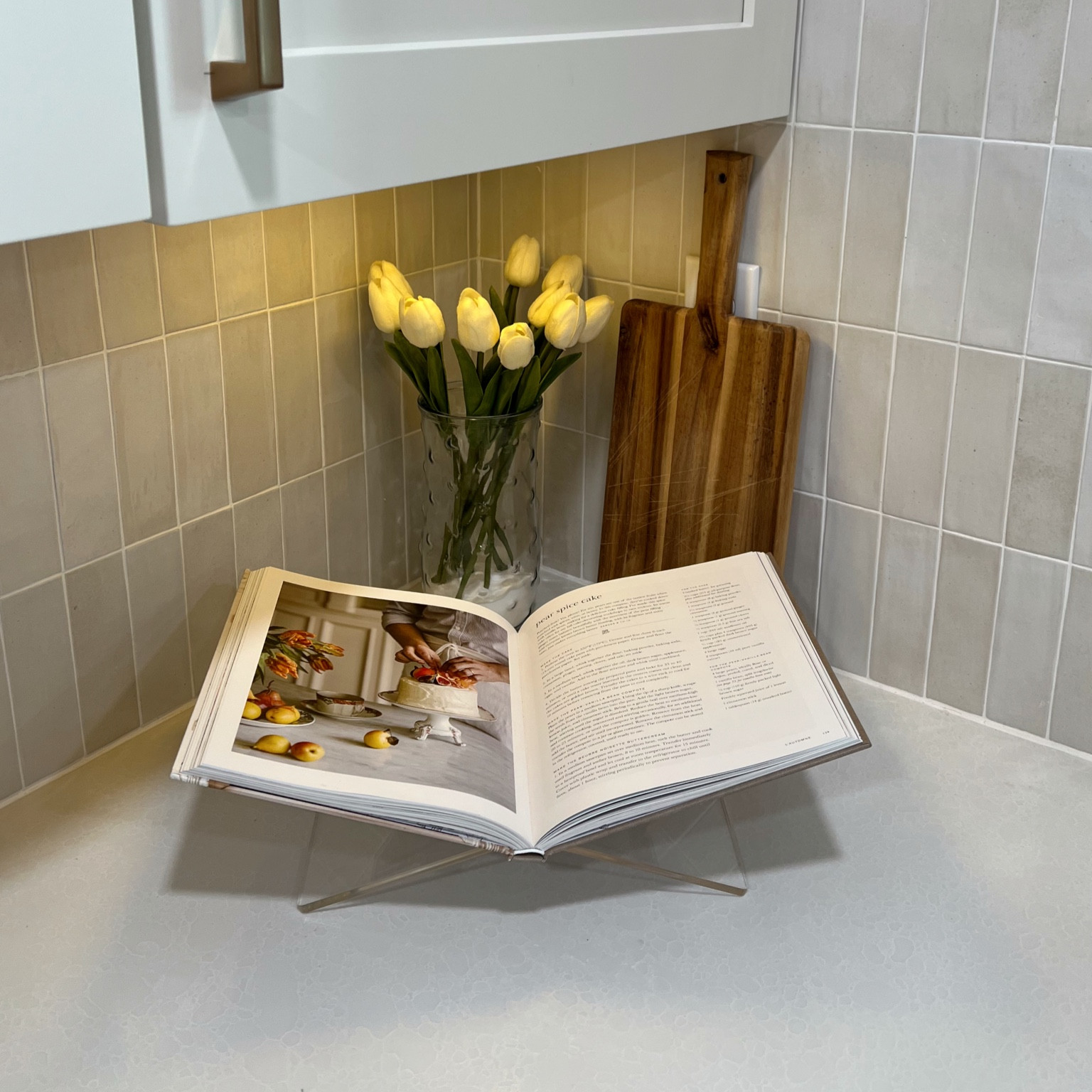 one of my favorite little corners in my kitchen this acrylic stand for cookbooks is so cute and helpful!! I also have fake tulips that look so good!

#LTKunder50 #LTKhome #LTKunder100