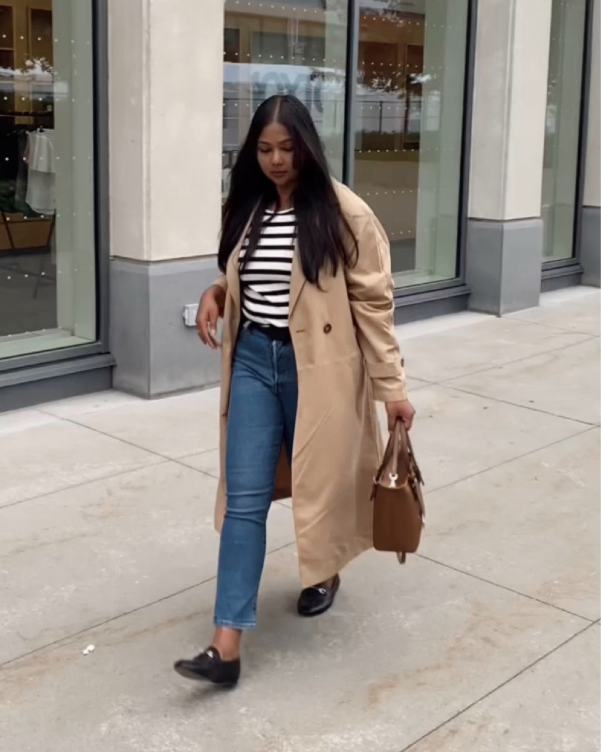 Spring Outfit, spring style, spring work outfit, summer outfit, Levi jeans, blue jeans, aritzia double-breasted trench coat, brown trench coat, long coat, gap halter tank top, stripe tank top, black and white tank top, Michael Kors bag, brown bag, coach loafers, black loafers, gold accessories, outfit inspiration, smart casual outfit ideas 

#LTKstyletip #LTKfindsunder100 #LTKworkwear