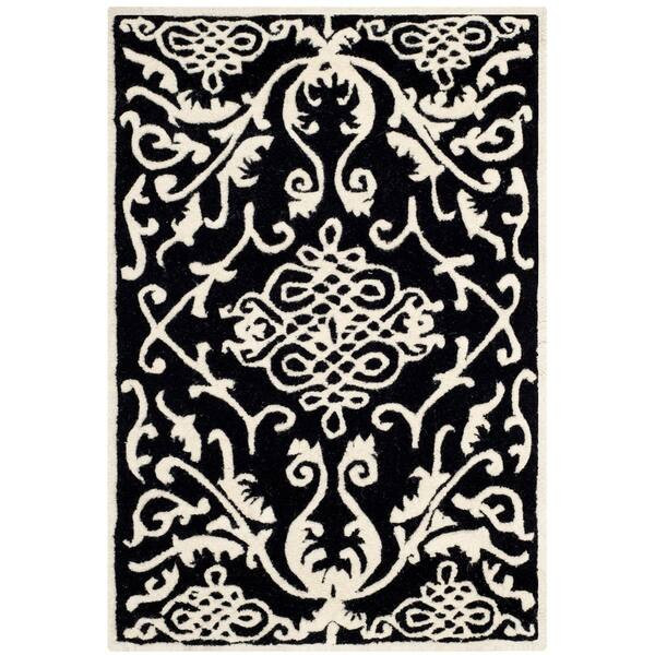 Safavieh Handmade Soho Razia N.Z. Wool Rug - 7'6" x 9'6" - Black/Ivory | Bed Bath & Beyond