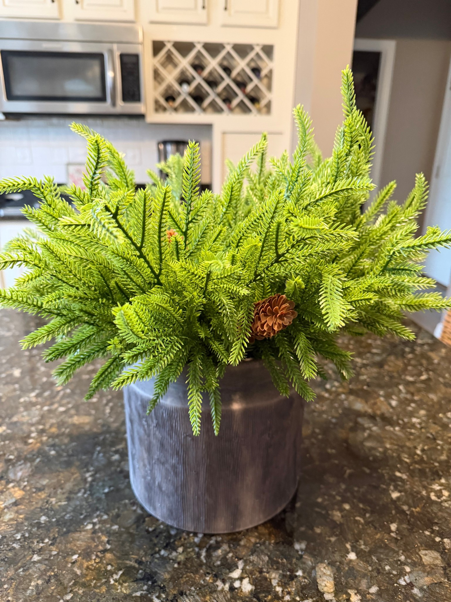 These artificial evergreen branches with pinecones look so real 🎄

#LTKHome #LTKFindsUnder50 #LTKHoliday