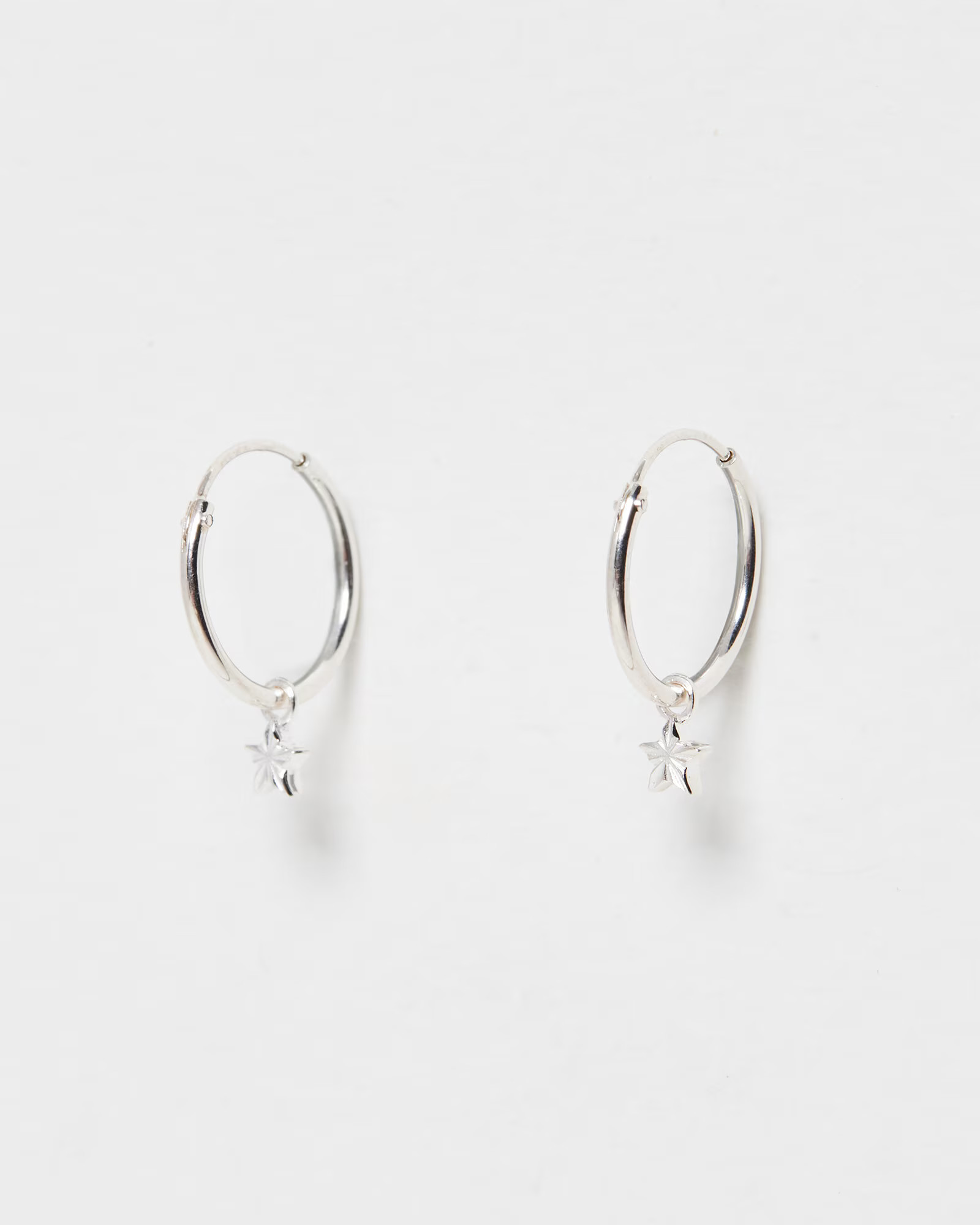 Haru Engraved Star Charm Silver Hoop Earrings | Oliver Bonas (Global)