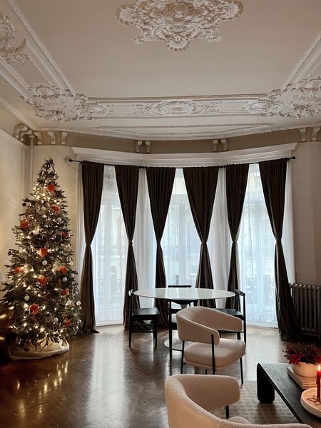 Velvet curtains, sheer curtains, slim, artificial Christmas tree, white living room, accent chair, area, rug, neutral, black rectangular coffee table

#LTKhome #LTKHoliday #LTKstyletip