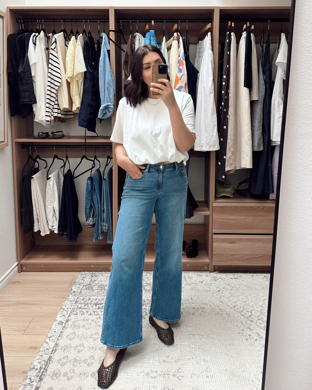 I love a white tee (probably too much) and I liked the bubble hem on this one. It IS more cropped so I'll have ot wear it with high waisted pants only. But I like the fit, I’m in the large and the fabric is a thick, opaque cotton. It’s a nice twist on an essential tee. 

PS: these are my favorite jeans right now and under $50! . 

 