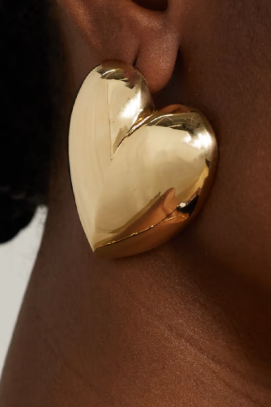 Bold heart ! #statementsearrings 

#LTKfindsunder100