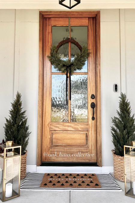 Minimalist Christmas porch 

Christmas porch, holiday porch, simple Christmas porch, porch faux trees, outdoor trees, Christmas wreath, holiday wreath, outdoor lanterns, outdoor ma

#LTKHoliday #LTKSeasonal #LTKhome