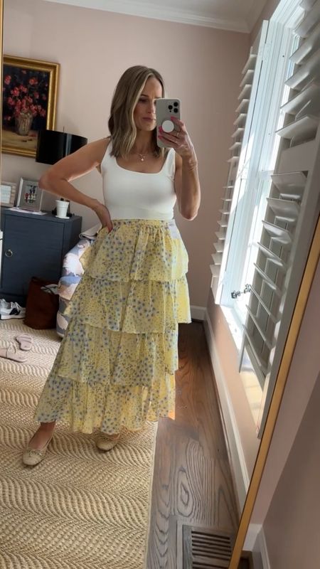 This tiered maxi skirt is SO fun for the summer! I have a size small petite and it fits TTS. My white tank is from Amazon and a size medium. Shoes are raffia ballet flats that run TTS. They are on sale right now — I love them. Don’t listen to the bad reviews. 

#LTKSeasonal #LTKStyleTip #LTKShoeCrush