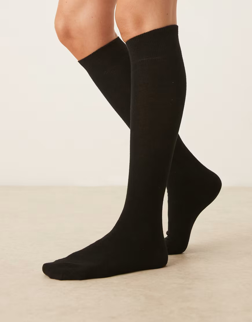 ASOS DESIGN knee-high socks in black | ASOS (Global)