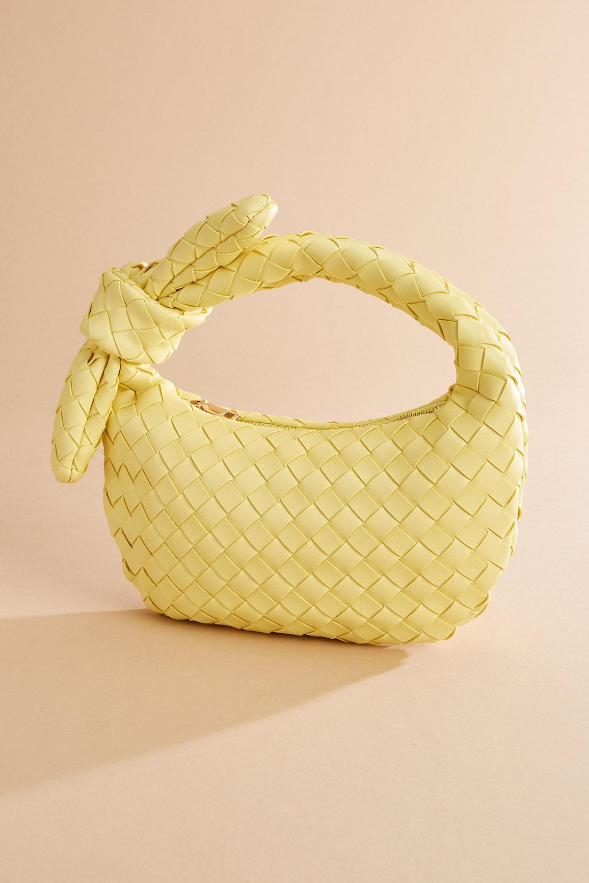 yellow woven bow handle crescent bag | Versona