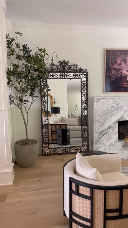 Oversized living room floor mirror with black iron details! Such a unique piece of decor that’s great leaning or can be hung as well!

#LTKhome #LTKsalealert #LTKstyletip