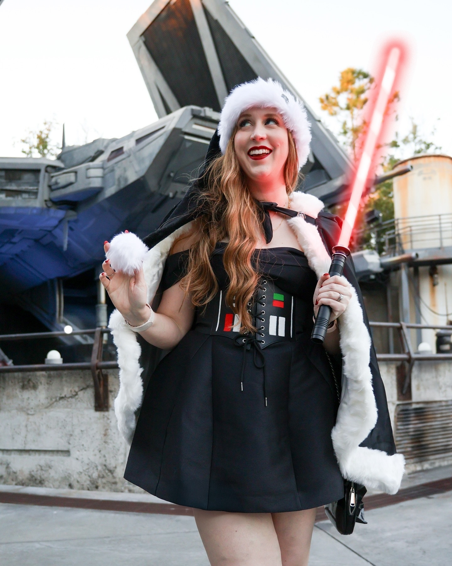 merry sithmas 🖤🎅🏼

i find your lack of cheer disturbing… i brought back one of my all-time favorite looks this year: my santa vader @thedisneybound ! i made a couple tweaks this year: i used a new dress i rented from @nuuly (referral code in my bio because i’m obsessed) and the vader corset i painted for my vader witch look at halloween 🖤

i just had the best evening wandering around batuu and enjoying my happy place ✨

dress: @nuuly 
purse: @loungefly 
hat, cape, vader pins: @amazonfashion 
corset & paint: @amazon 
lightsaber (plus tape to make it a candy cane): @amazon 
necklace: @kendrascott 
boots: @vionicshoes 

#starwars #darthvader #disneybound #disneystyle #starwarsstyle #merrysithmas #hollywoodstudios @disneyparks @waltdisneyworld @starwars