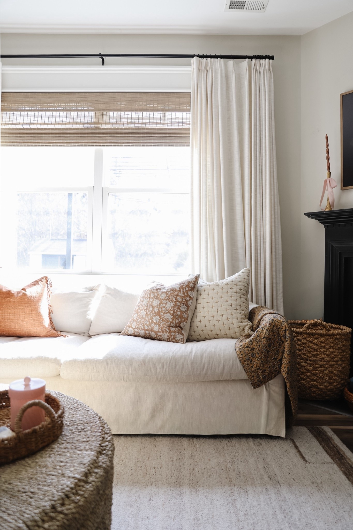 Neutral living room, comfortable slip cover style sofa, large woven coffee table 

#LTKHome