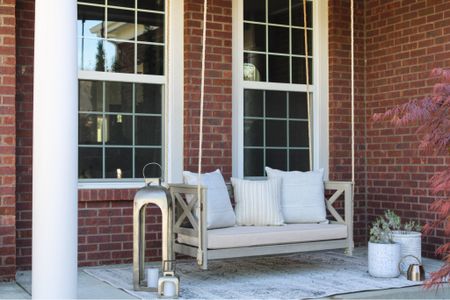 3 years and this porch swing is just as beautiful! Shop the outdoor rug, pillows and other porch decor for spring. 

#LTKSeasonal #LTKhome #LTKstyletip