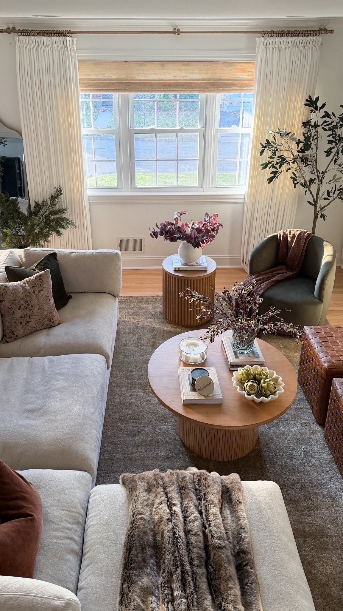 Somehow this room becomes the heart of our home every holiday season 🤎
It’s where the kids pile onto the sofa with blankets, where we sip coffee before the day gets loud, and where we end the night with Christmas movies and snacks we probably don’t need. 😍🙈

I wanted it to feel calm and layered, not overloaded — soft textures, warm wood tones, winter stems, and just enough seasonal touches to make it feel special without changing everything.

Follow my LTK @meggieferrerhome on the @shop.LTK app to view this post and get my exclusive app-only content!

#liketkit #LTKHoliday #LTKSaleAlert #LTKHome
@shop.ltk
https://liketk.it/5EBf0

#LTKHome #LTKSeasonal #LTKHoliday