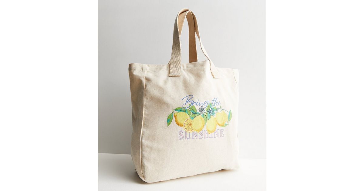 Cream Bring the Sunshine Lemon Logo Canvas Large Tote Bag
						
						Add to Saved Items
						R... | New Look (UK)