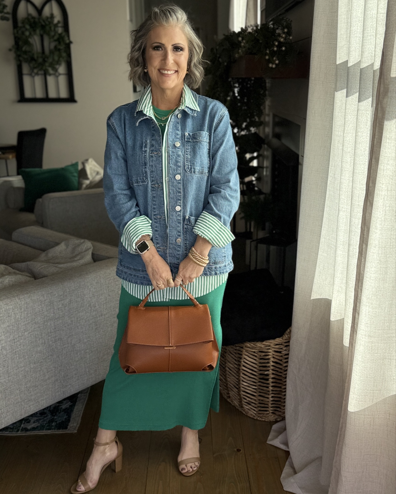 My Elevated Style Girlies — One dress, 7 ways—because every great style story starts with a versatile base! Today’s look is all about this green maxi dress from Target, styled with sneakers, flats, and heels to show how layering + shoes totally transform a look. 

📝 Breakdown Final Style Story:
* Perfect Starter: This maxi dress acts as a blank canvas for styling with shirts, jackets, blazers, and accessories.
* Shoes: High-Heeled Sandals (Amazon) elevates the look—both literally and stylistically. Keeps attention on the layering but gives the outfit a more polished, ready-to-step-out vibe.
* Layering: Green and White Striped Button-Down Shirt (Amazon)Worn open and untucked for a relaxed vibe, this shirt adds pattern and preppy contrast to the solid maxi. Plus add a Denim Chore Jacket (Walmart) this structured piece adds polish while keeping the outfit casual-cool. The longer length of the jacket paired with the maxi length of the dress creates an elongated silhouette that’s perfect for layering. Rolling the cuffs of the jacket to reveal the striped shirt adds a thoughtful, styled detail.
* Accessories: Adds elegance to the look while contrasting beautifully against the green and denim. Refined finish that makes this outfit work-appropriate or brunch-ready.
* Style Vibe: Effortless Spring Sophistication 🌿 This look channels classic polish with a touch of laid-back charm. The color palette feels fresh and crisp, perfect for transitional spring days, while the mix of textures—cotton, denim, and leather—adds depth and interest. It gives “I’m ready for whatever the day brings,” whether that’s casual coffee dates, creative workdays, or a polished dinner out. It’s a modern take on timeless style with just the right amount of glam.

#LTKFindsUnder50 #LTKOver40 #LTKStyleTip