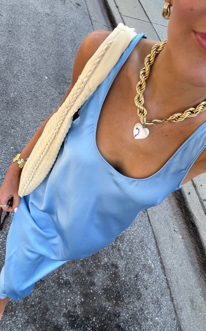 Sleek blue silk dress, wonderful for a pop of color in the summertime🩵🩵 Goes perfectly with a chain link necklace and crochet purse ! 

#LTKselfcare #LTKdayinmylife #LTKootd