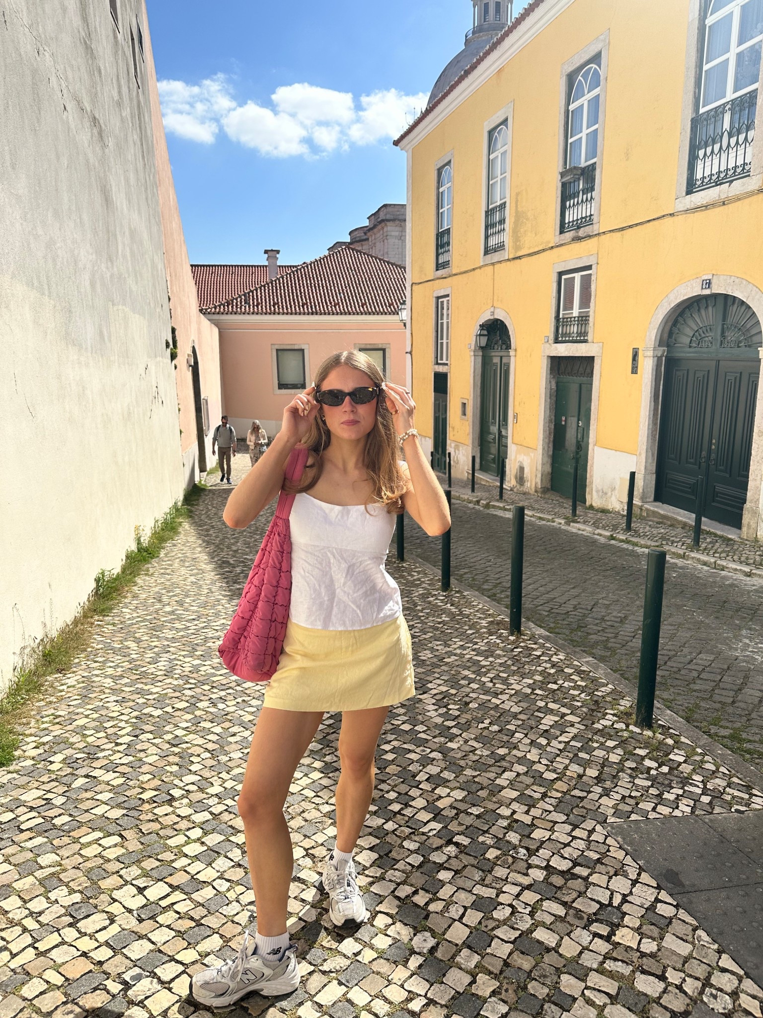 butter yellow mini skirt
white top & pink bag 

#LTKsummer #LTKeurope #LTKspring