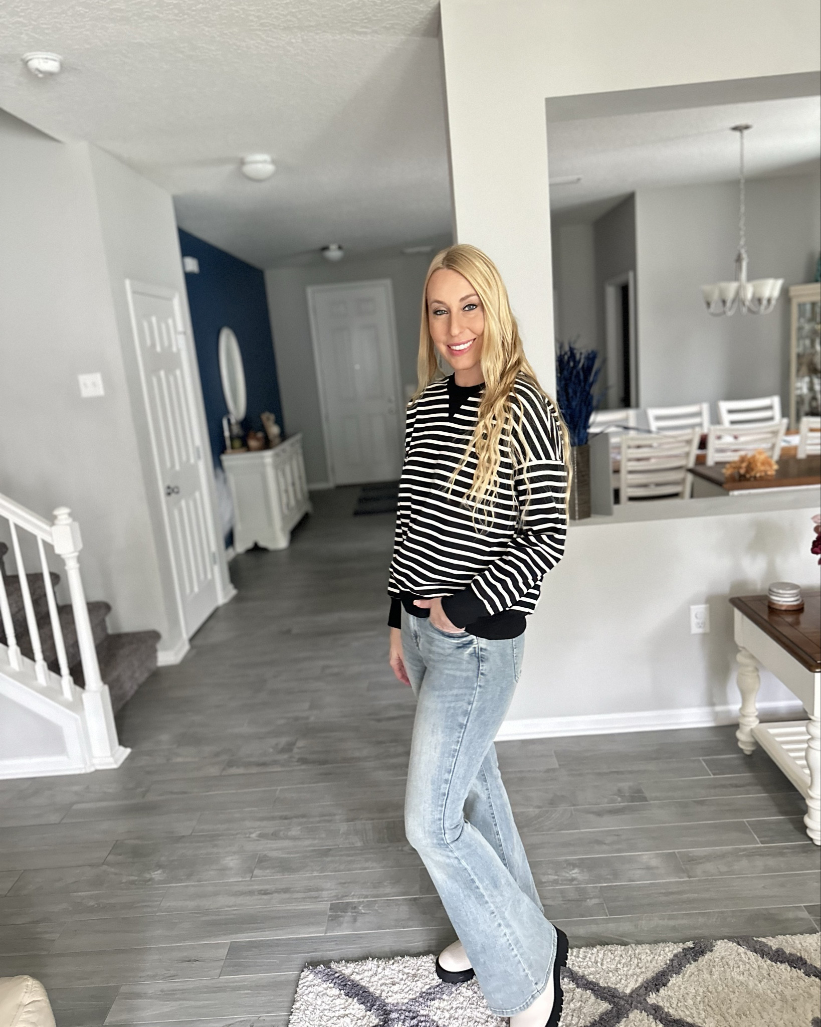 Black and white striped sweatshirt 
🖤 oversized and extra comfy 
🖤 comes in lots of colors 
🖤 wearing size small, fits true to size 

#LTKStyleTip #LTKFindsUnder100 #LTKFindsUnder50