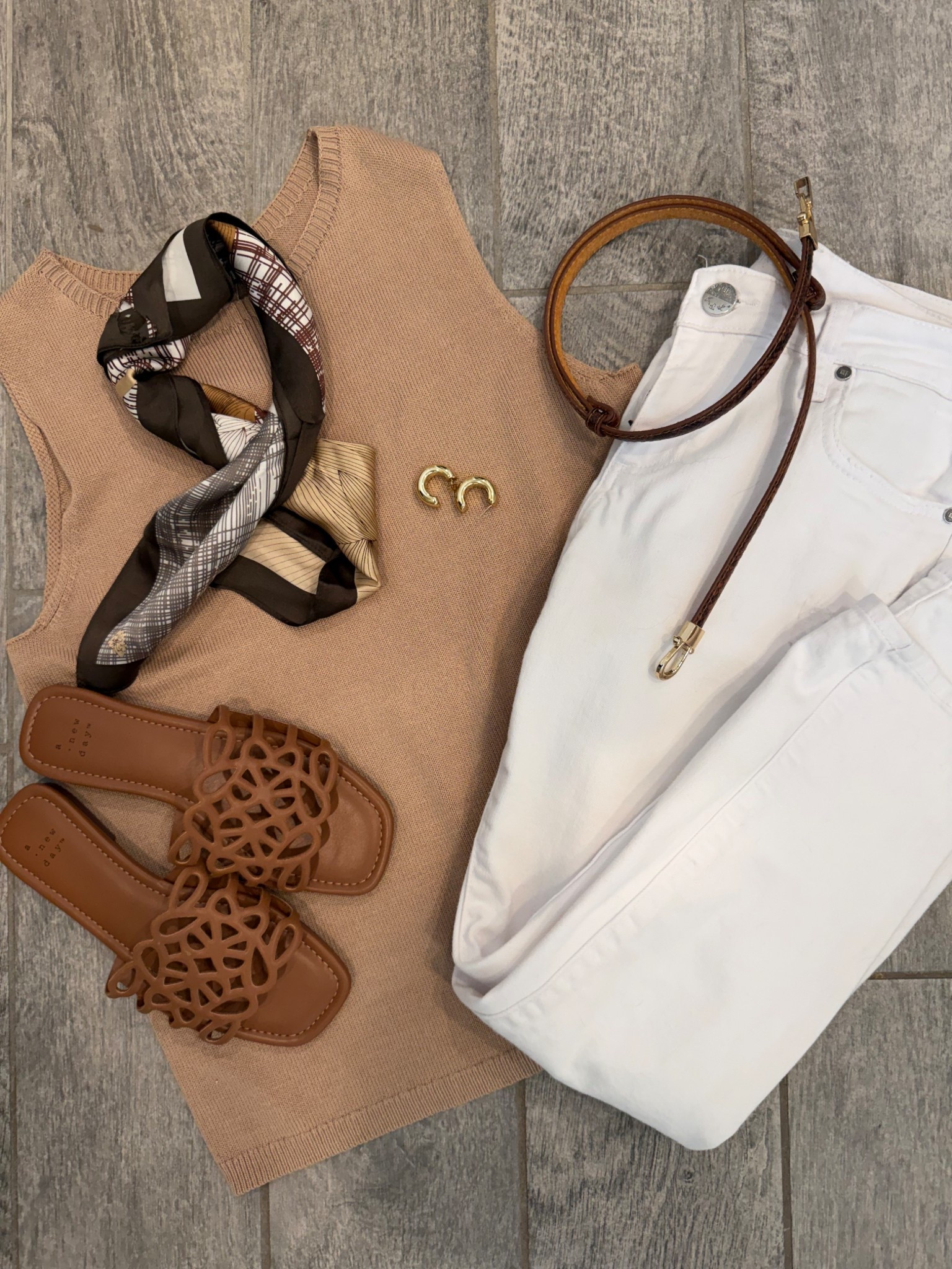 Classic neutral and chic- simple for many occasions and perfect for travel white jeans , neutral
Knit top, sandals belt, scarf 

#LTKootd #LTKOver40 #LTKgrwm