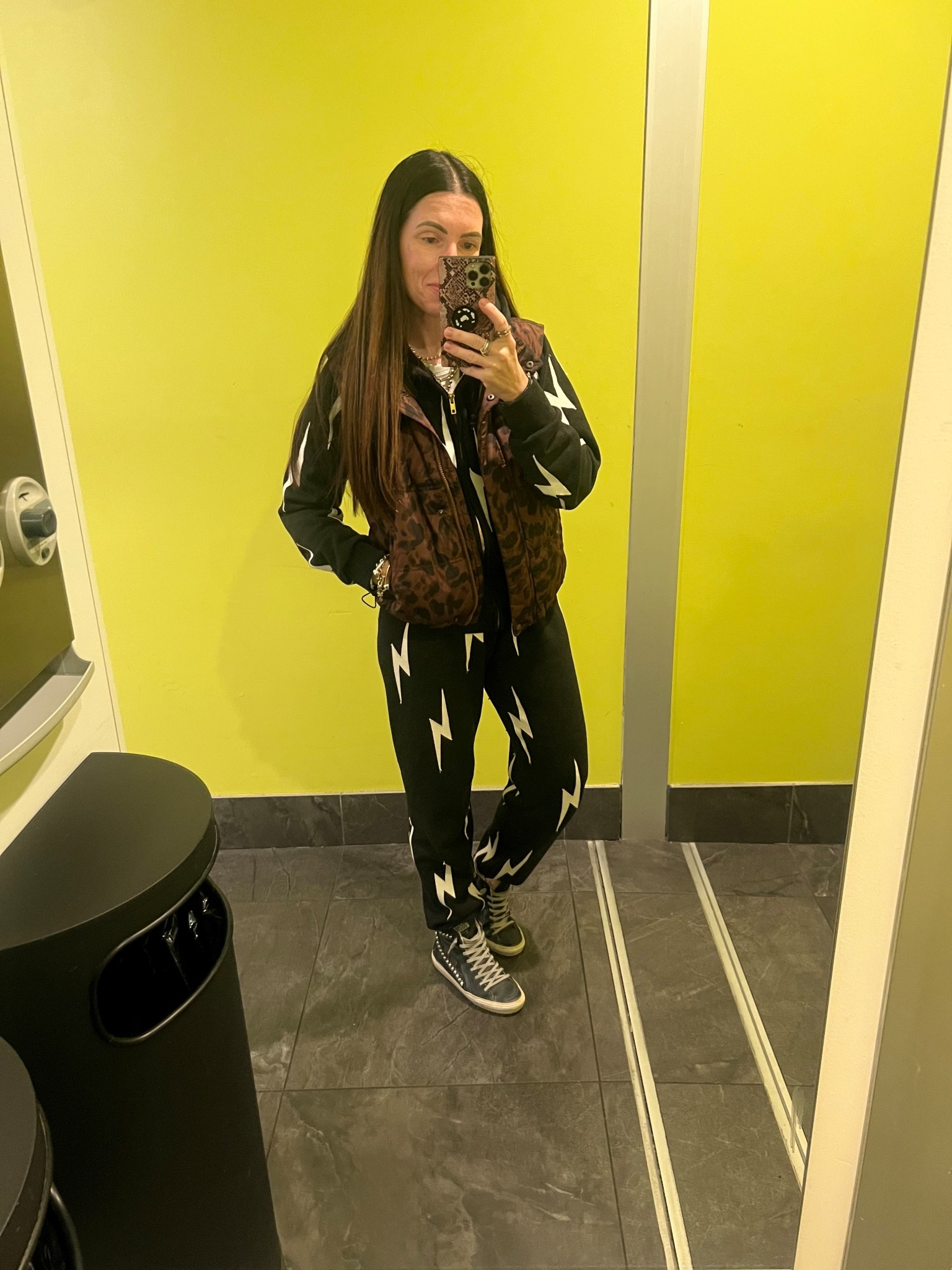 Sweats plus puffer vest.  Great travel outfit!