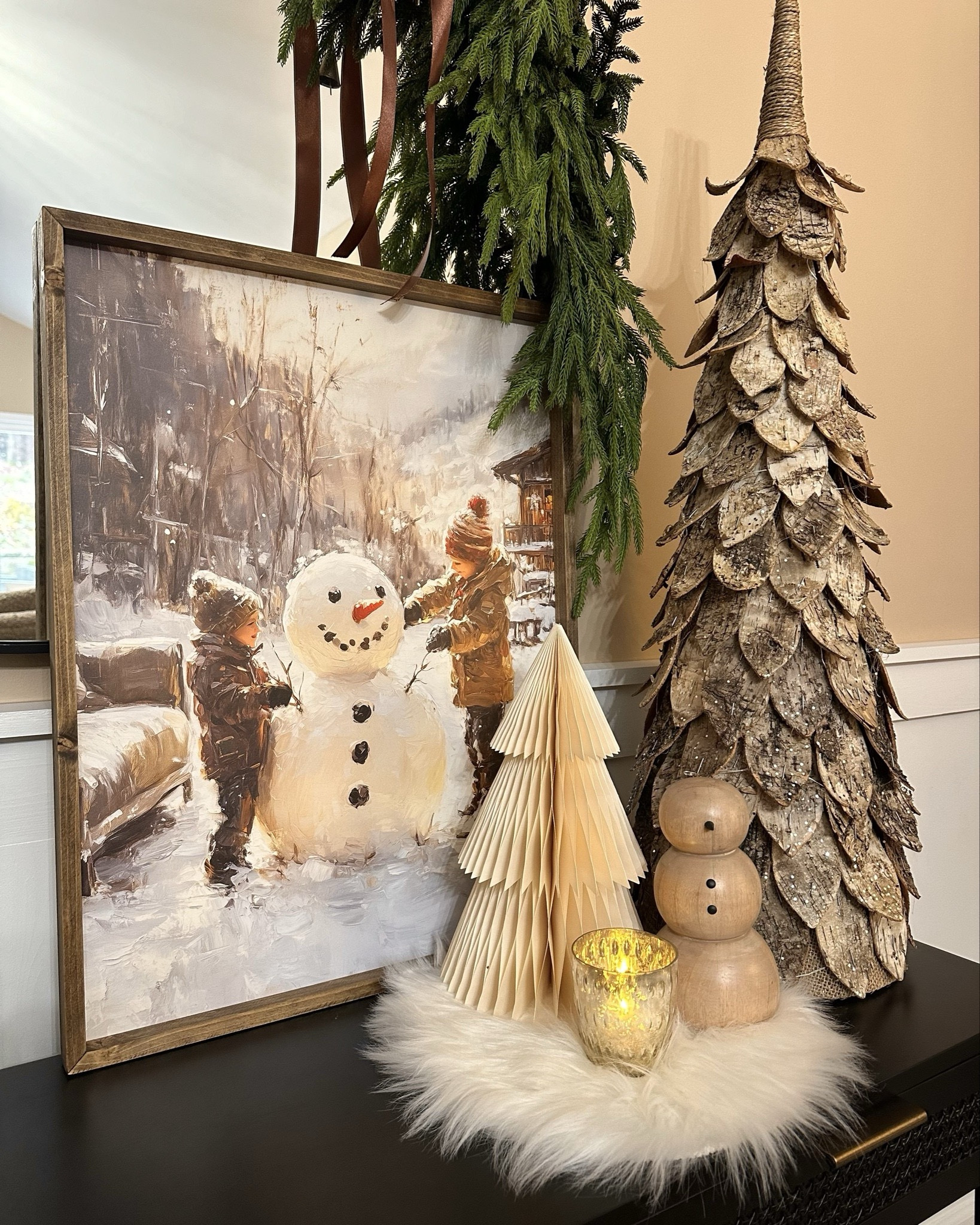 Neutral Christmas Console. Follow @farmtotablecreations on Instagram for more inspiration.

Last year, I opted for a whimsical snowman theme here on my console table since I couldn’t resist this most adorable, “Do You Want To Build A Snowman” artwork. 

For reference:
Artwork: size 18x24
Garland on mirror: 1 shown plus 3 Norfolk Stems
Garland on table: 1 shown plus 2 Norfolk Stems
Lit Birch Tree: size Large
Paper Tree on Left: Size XL
Paper Tree on Right: Size L

Christmas Decor | console table | console table styling | faux stems | entryway space | target finds | neutral decor | entryway decor | cozy home | affordable decor | Studio McGee | Target finds | home decor | pottery barn


#LTKHoliday #LTKHome #LTKSaleAlert