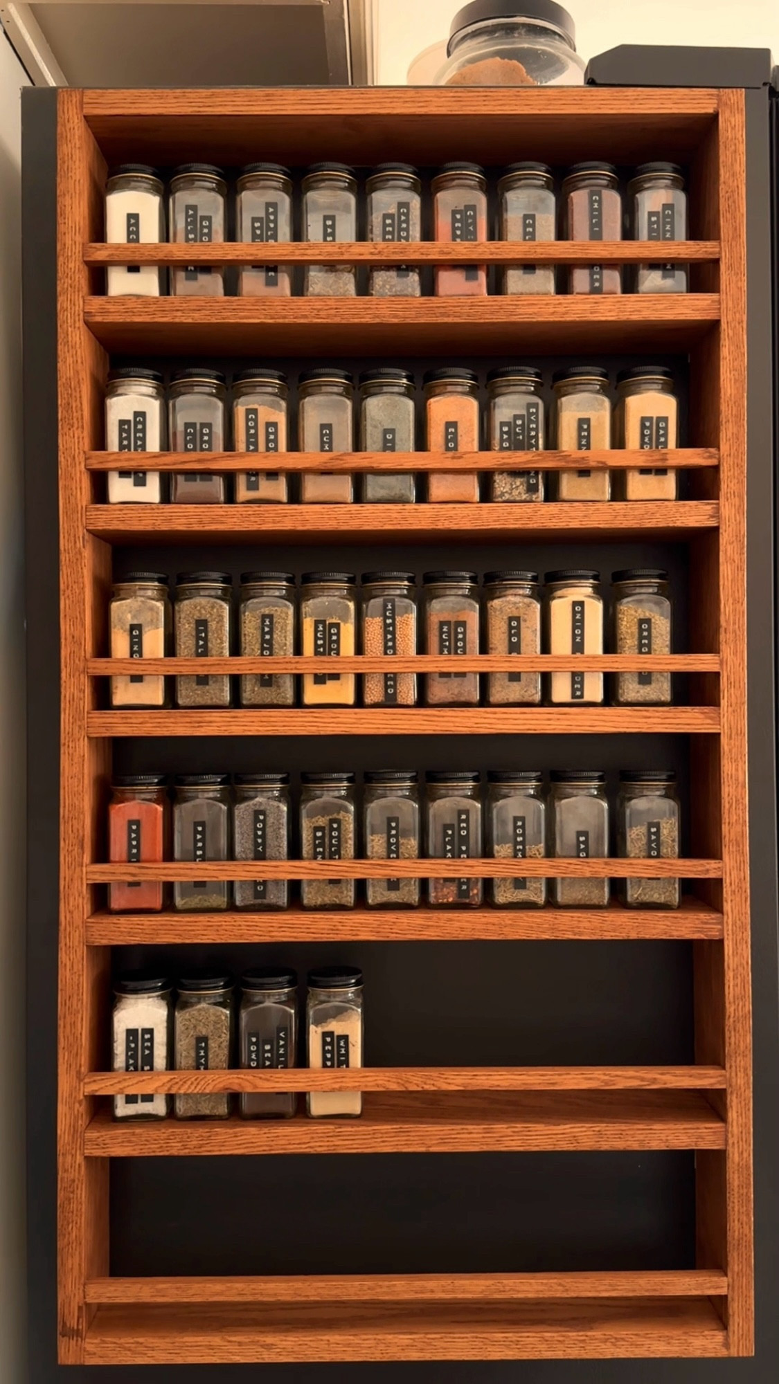 Our kitchen is on the smaller side with VERY minimal storage space, so I’ve had to get creative with where & how to store our necessities. I’ve been on the hunt for a spice rack that fit into the cozy aesthetic of our kitchen seamlessly and wasn’t made out of cheap acrylic or metal. I stumbled upon this beauty on @etsy, asked the seller for a custom size, bought heavy duty magnets on @amazon, and stuck it to the side of the fridge! It’s SO perfect and exactly what I was looking for!

#homedecor #interiordesign #kitchen #kitchendecor #kitchendesign #cozykitchen #kitchenorganization #kitchenfind #kitchenfinds #kitchenmusthaves #cozyathome #cottagecore #cottagecoreaesthetic #spicerack #spicejars #kitchenorganization 

#LTKHome #LTKFindsUnder100 #LTKFindsUnder50
