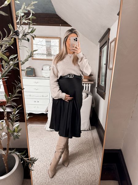 Love this satin midi skirt from temu, I sized up one to a large so it’s bump friendly. Such good quality and it’s only $12
Sweater is temu also, wearing a medium
Maternity outfit 

#LTKbump