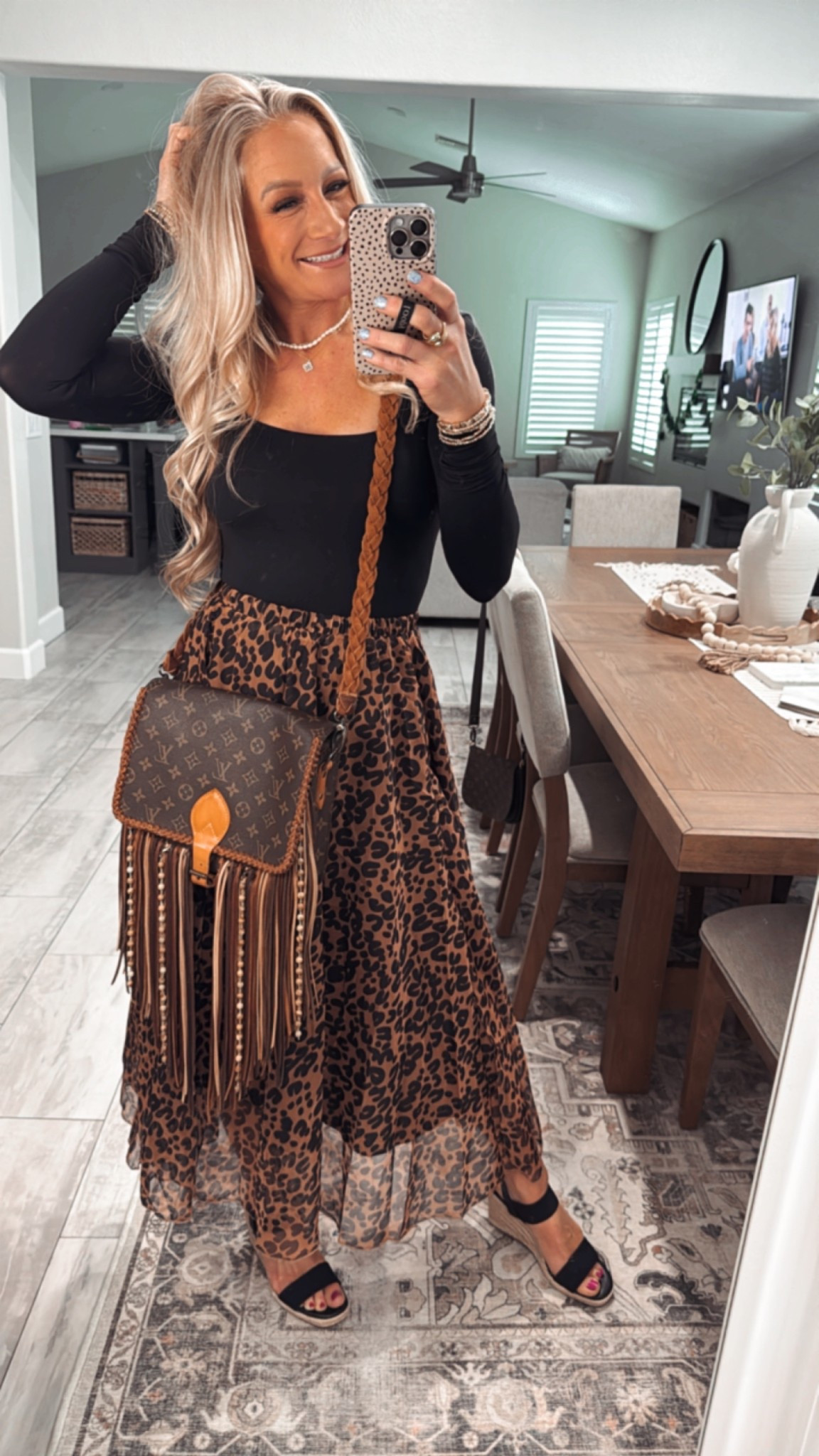 Leopard skirt paired with deep back bodysuit for girls night! Black wedge sandals, gold accessories, and designer bag 🔥 turn it up a notch! 

Zara bodysuit Amazon skirt and sandals Target and Amazon pavoi accessories girls night date night outfit skirt can be workwear with a sweater and black ballet flats