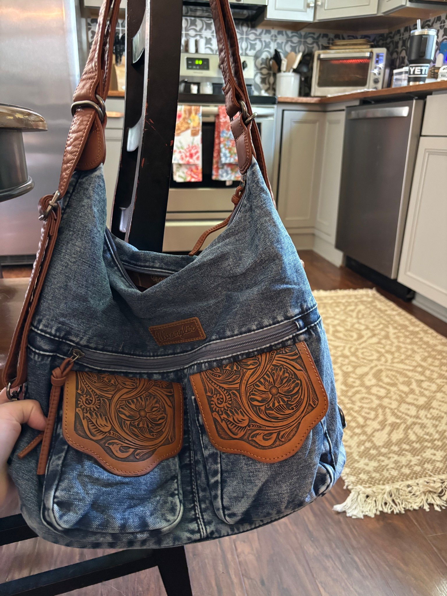 My favorite all purpose bag from Montana west! Sold at Cavenders! I got mine for $20 less at Wild West Boutique! I have both colors and love the versatility! Can be a backpack or regular purse! I use it as a diaper bag because of how much it can hold! Love the tooled leather features as well!

#LTKFamily #LTKStyleTip #LTKGiftGuide