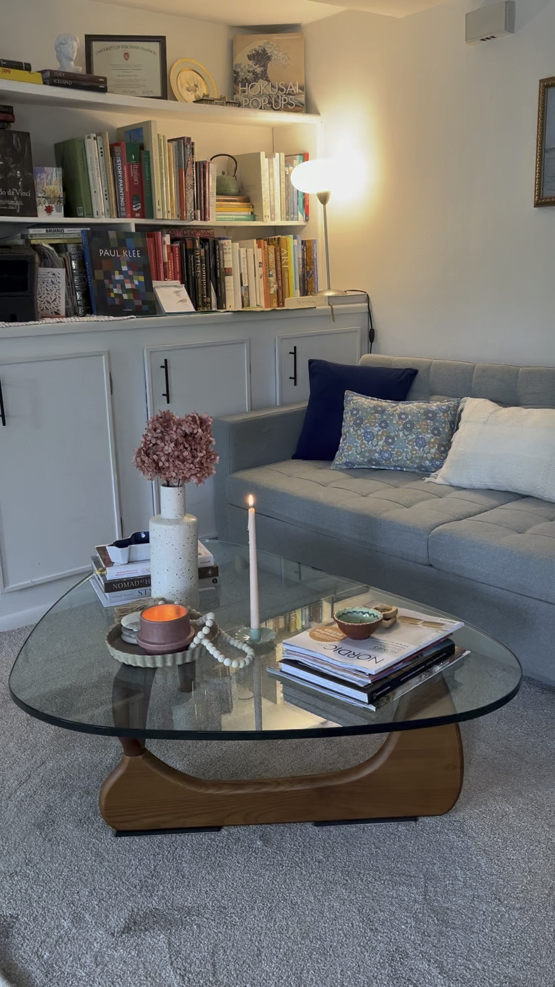 Living room inspiration/styling! Sage green sofa, landscape art, midcentury modern design, midcentury modern furniture, Noguchi style coffee table, coffee table styling, throw pillows. 

#LTKSeasonal #LTKHome #LTKStyleTip