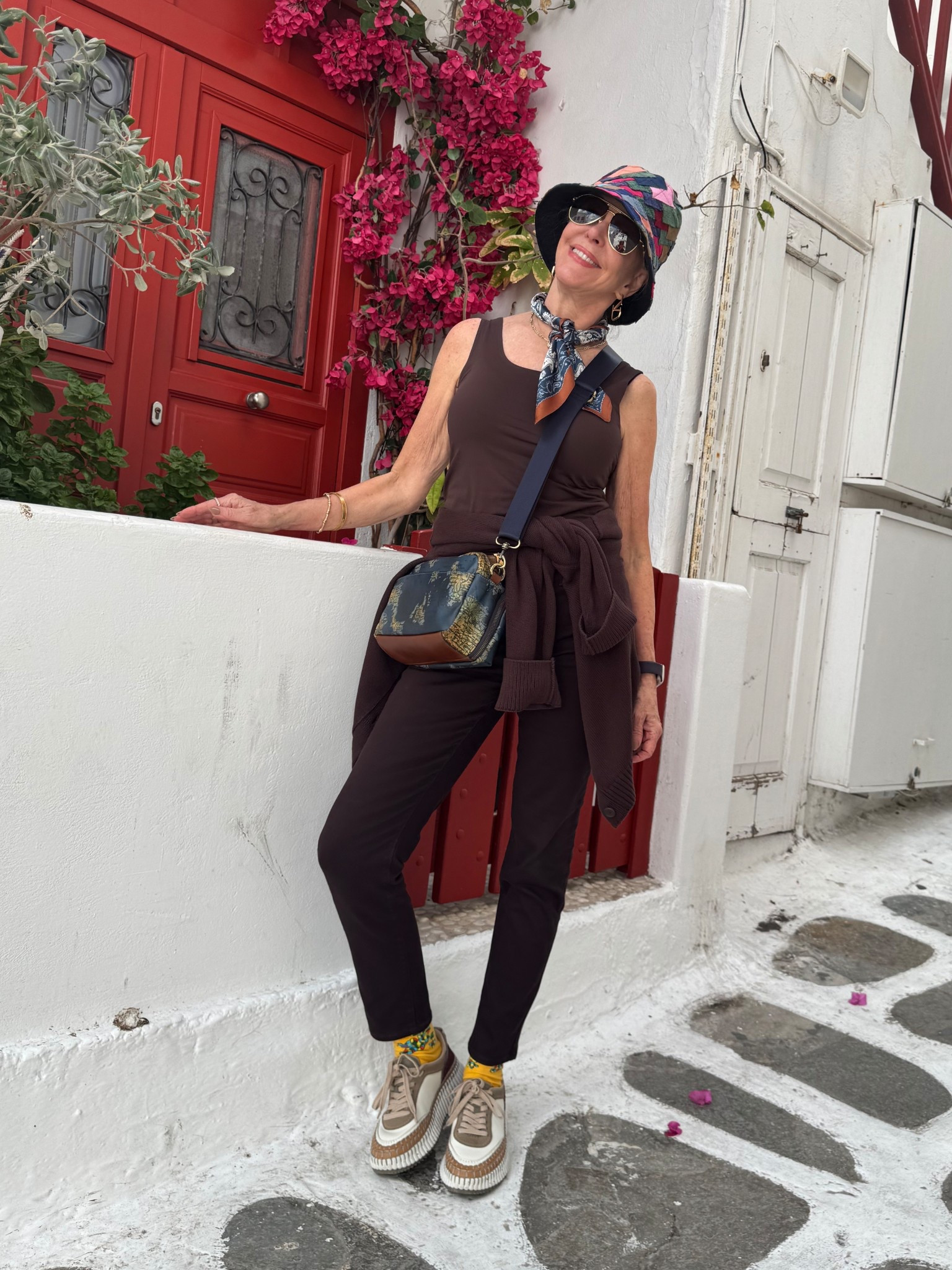  Chocolate slim ankle jeans. 
Brown tank top/ camisole 
Chloe platform sneakers
Brown cardigan sweater. 

#LTKStyleTip #LTKSaleAlert #LTKOver40