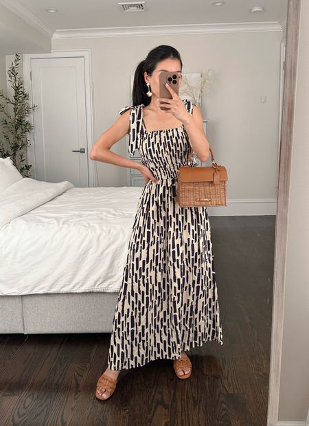 Tried on this smocked tie shoulder dress which would make an easy spring to summer sundress outfit that is bump and nursing friendly.

•Smocked sundress xs
•Slide sandals sz 5
•Gingko leaf earrings (similar pair also linked) 
• modern picnic mini lunch bag - JEAN20 for 20% off

#petite navy blue maxi / midi dress 

#LTKSeasonal #LTKstyletip