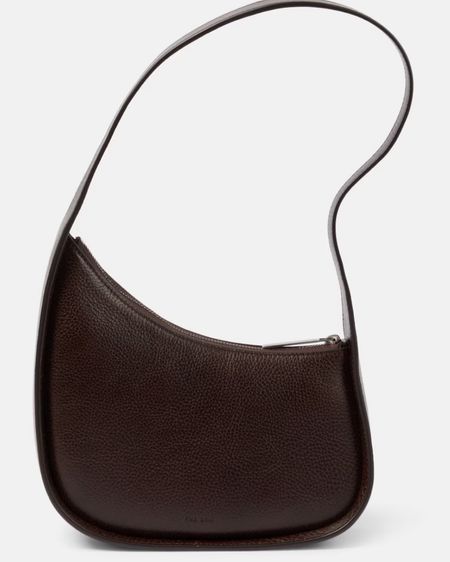 New color and leather alert from The Row Half Moon Bag- now comes in a gorgeous rich brown in grained leather so it’s more scratch resistant than the original smooth leather- this will sell out quickly! 

#LTKstyletip #LTKitbag #LTKover40