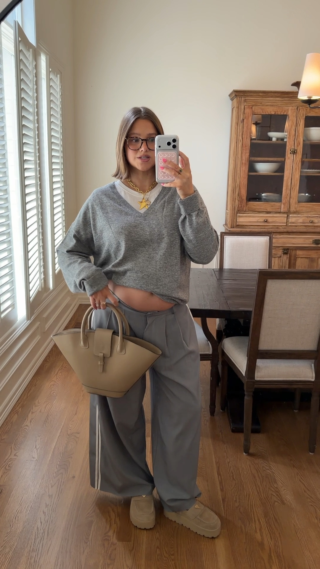 Linked similar sweater. Lioness track pants size L and I cut three inches off the bottom because they were soo long. FP movement tee size L I love the fit. Bracha jewelry. Will link similar bag (this is Paris 64 brand) Prada loafers my go to shoes I wear all the time true to size  

#bresheppard #babybump #pregnancy #lioness 

 #ltkbump #ltkgrwm