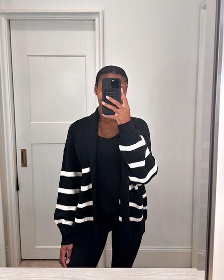 Target find! Love this black and white striped cardigan. Under $30! I sized up for a bit of an oversized look! 🖤

#LTKSeasonal #LTKfindsunder50 #LTKstyletip