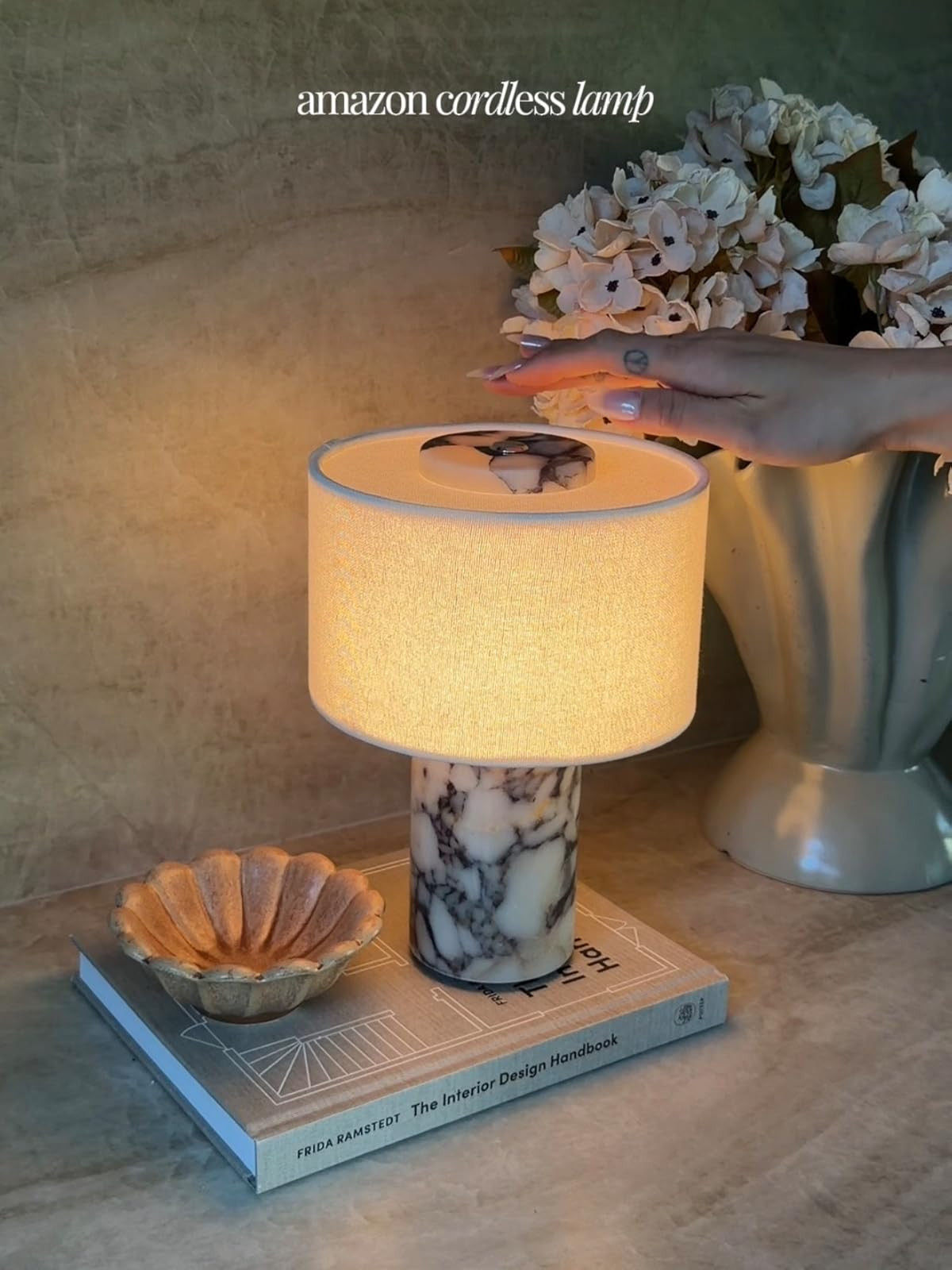 This cordless marble lamp is a beautiful touch to any room. It's stylish and practical, perfect f... | Amazon (US)