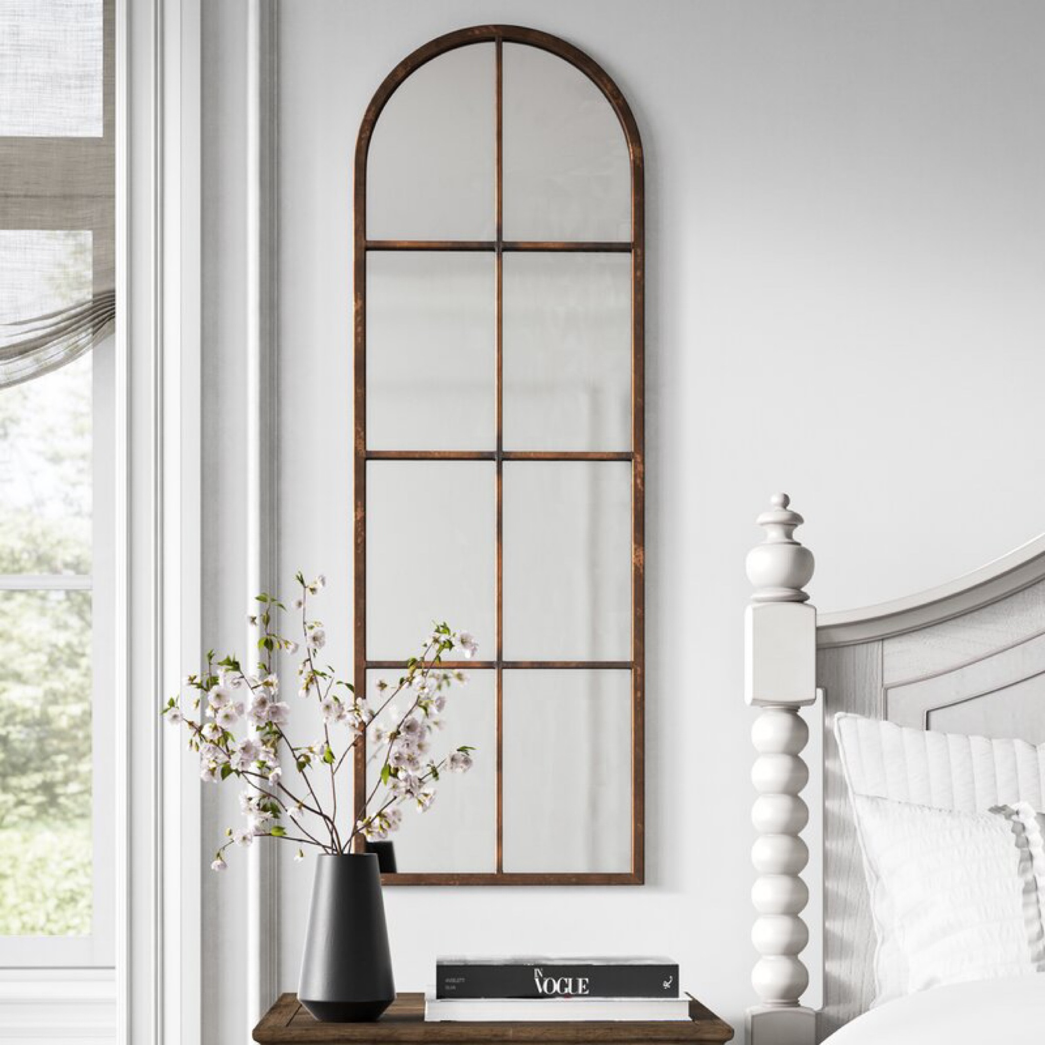 This arched mirror is the perfect size to style behind a nightstand. It has an antique finish and frame. 

#LTKhome